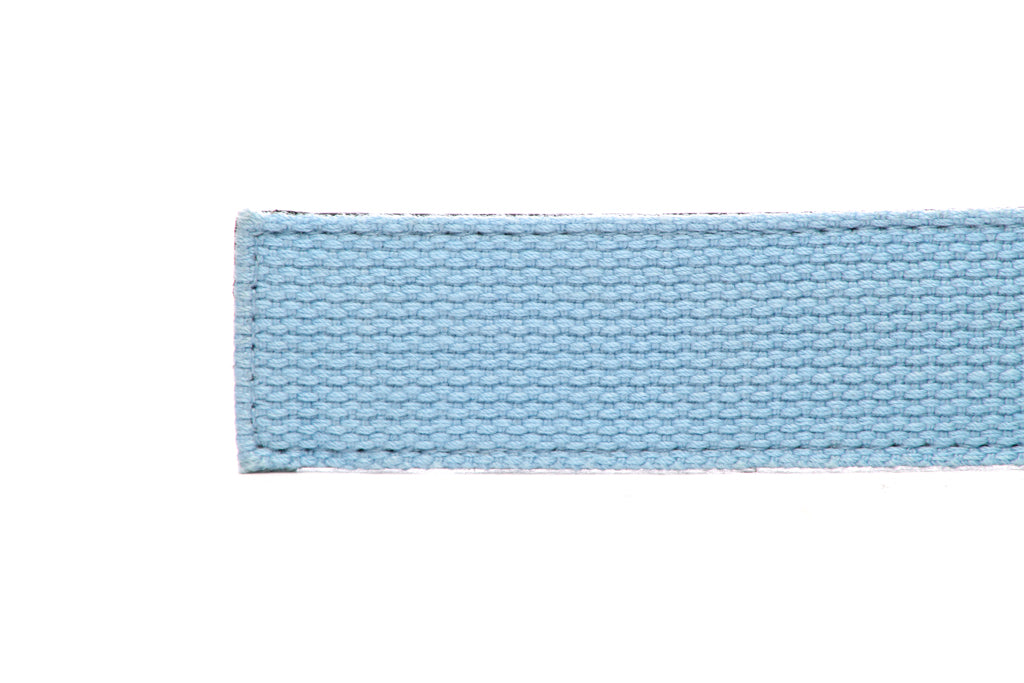 Men's canvas belt strap in light blue with a 1.25-inch width, casual look, tip of the strap