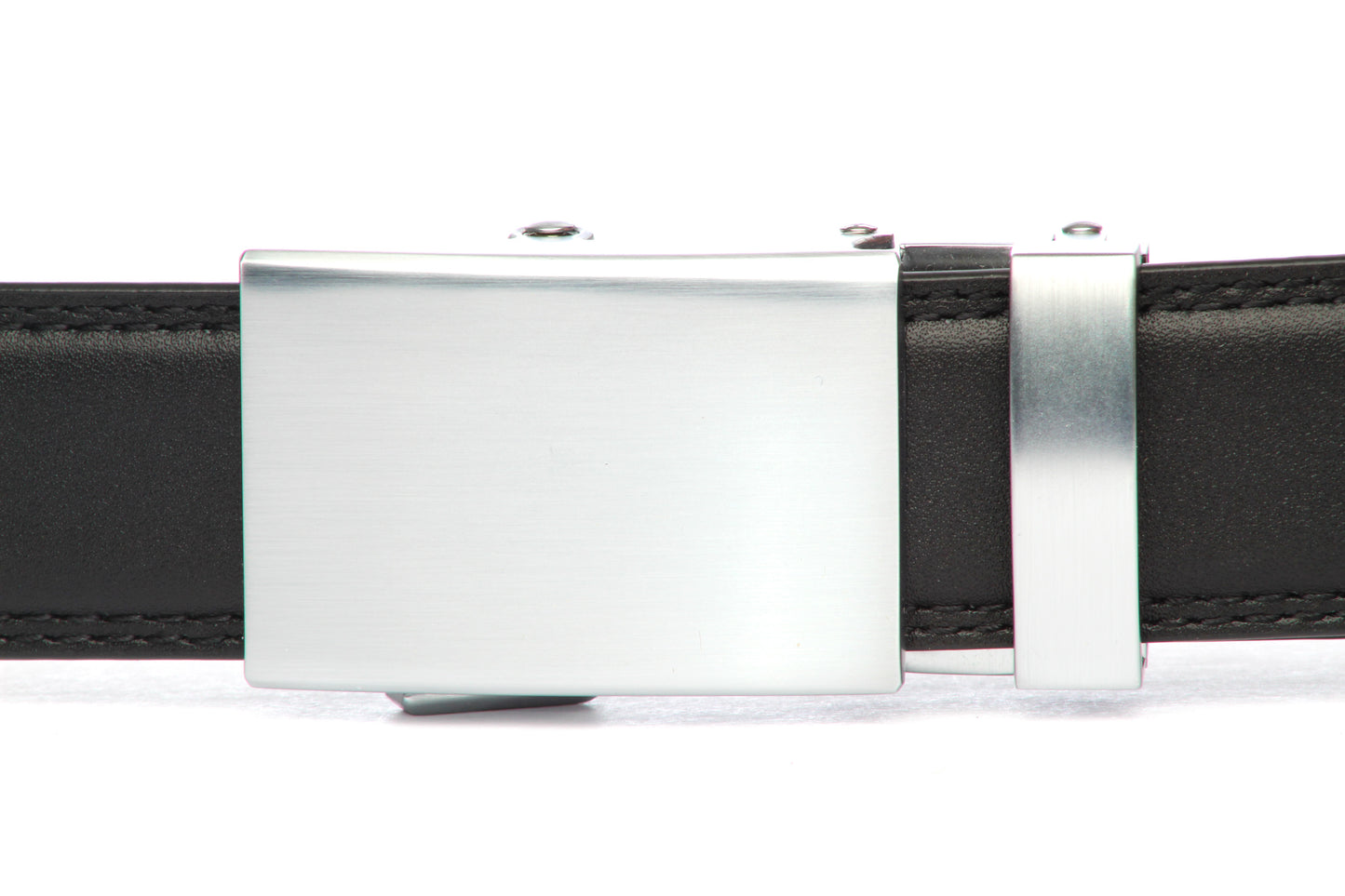 Men's classic ratchet belt buckle in silver with a 1.25-inch width, front view.