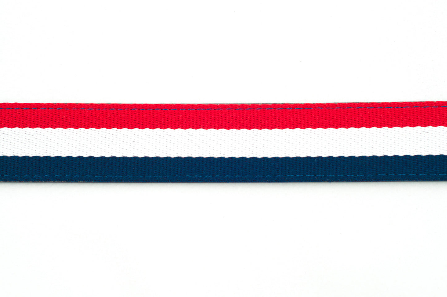 Men's cloth belt strap in red-white-blue with a 1.25-inch width, casual look, stitching close up