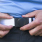 Men's golf ratchet belt buckle in black with a width of 1.5 inches, complete look.
