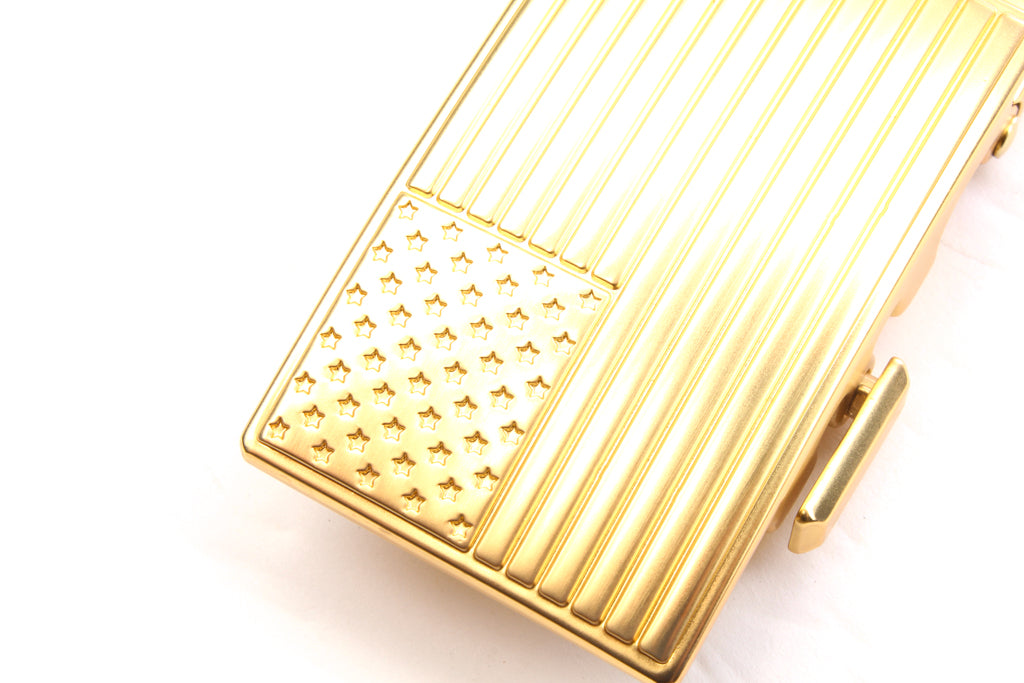 Men's USA flag ratchet belt buckle in gold with a width of 1.5 inches, close up front view.