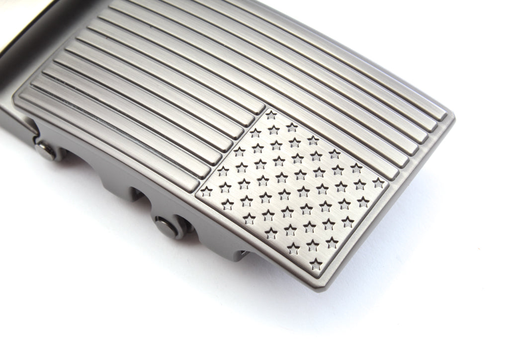 Men's USA flag ratchet belt buckle in gunmetal with a width of 1.5 inches, close up front view.