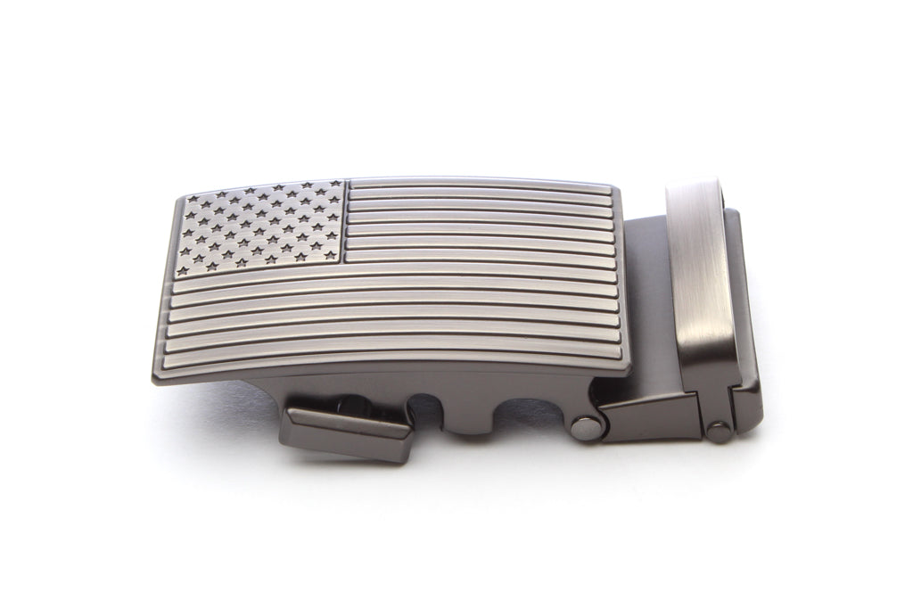 Men's USA flag ratchet belt buckle in gunmetal with a width of 1.5 inches, left side view.
