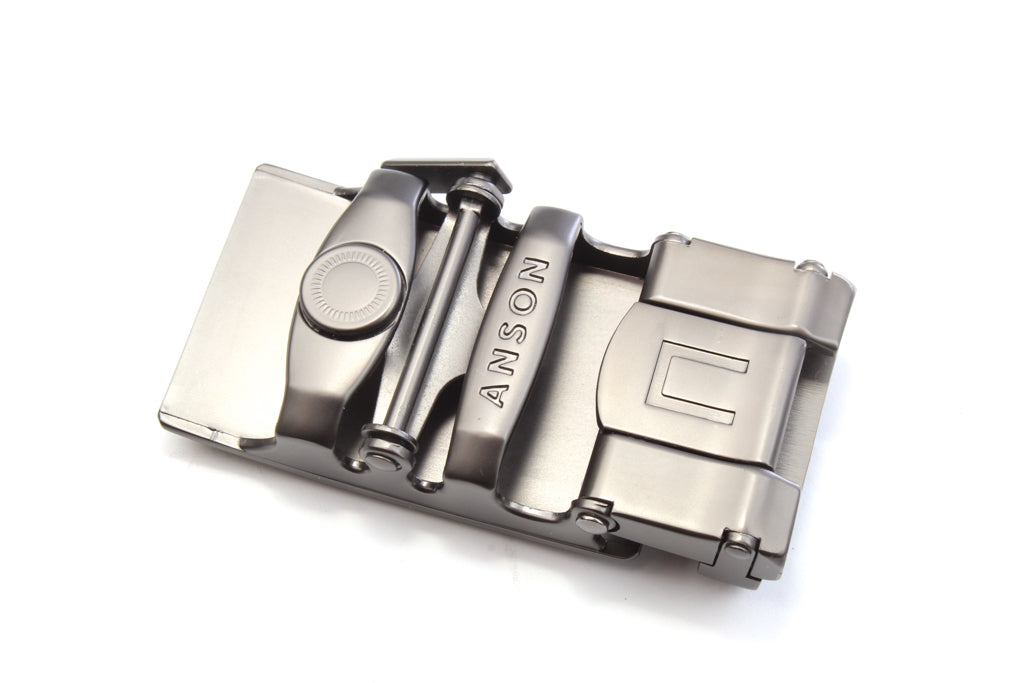 Men's USA flag ratchet belt buckle in gunmetal with a width of 1.5 inches, mechanism view.