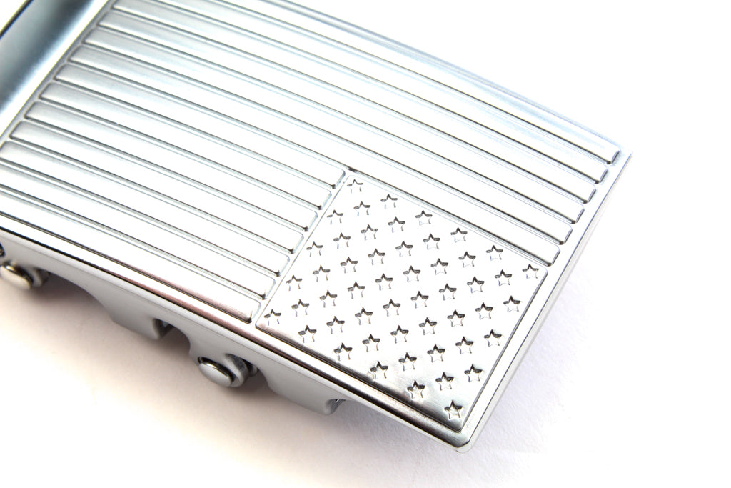 Men's USA flag ratchet belt buckle in silver with a width of 1.5 inches, close up front view.