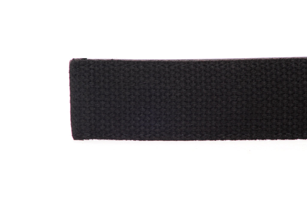 Men's canvas belt strap in black with a 1.25-inch width, casual look, tip of the strap