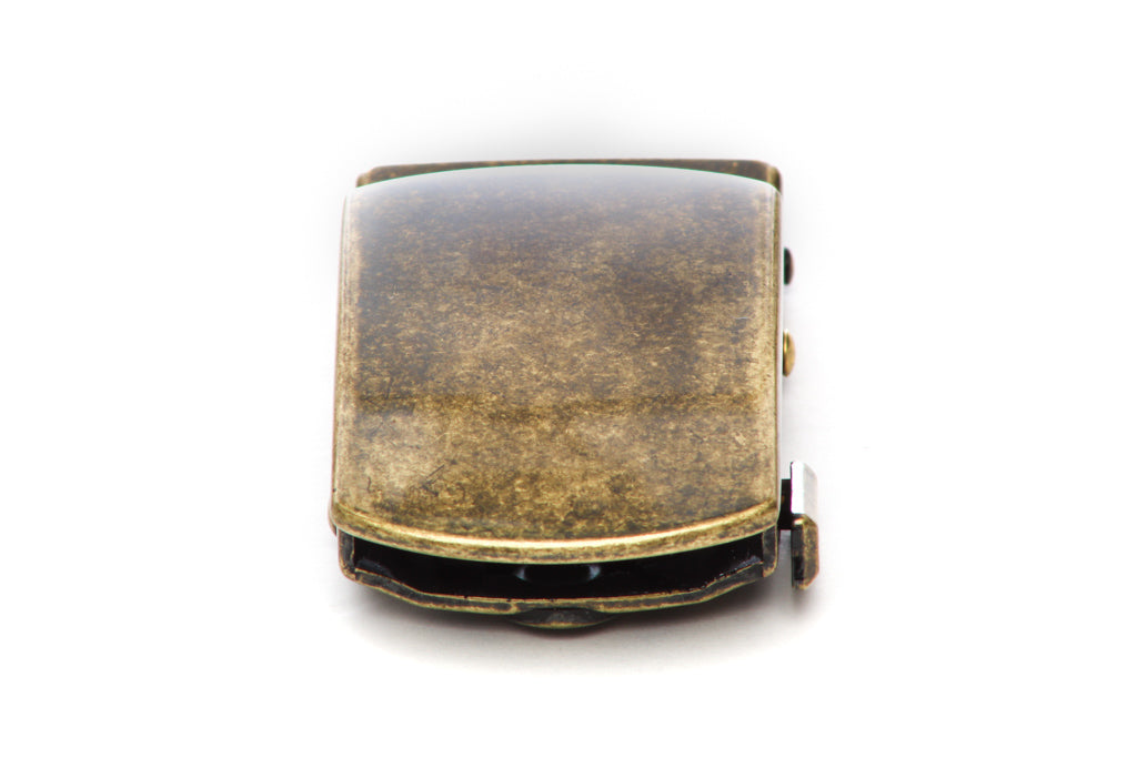 Men's classic with a curve ratchet belt buckle in antiqued gold with a 1.25-inch width, front view.
