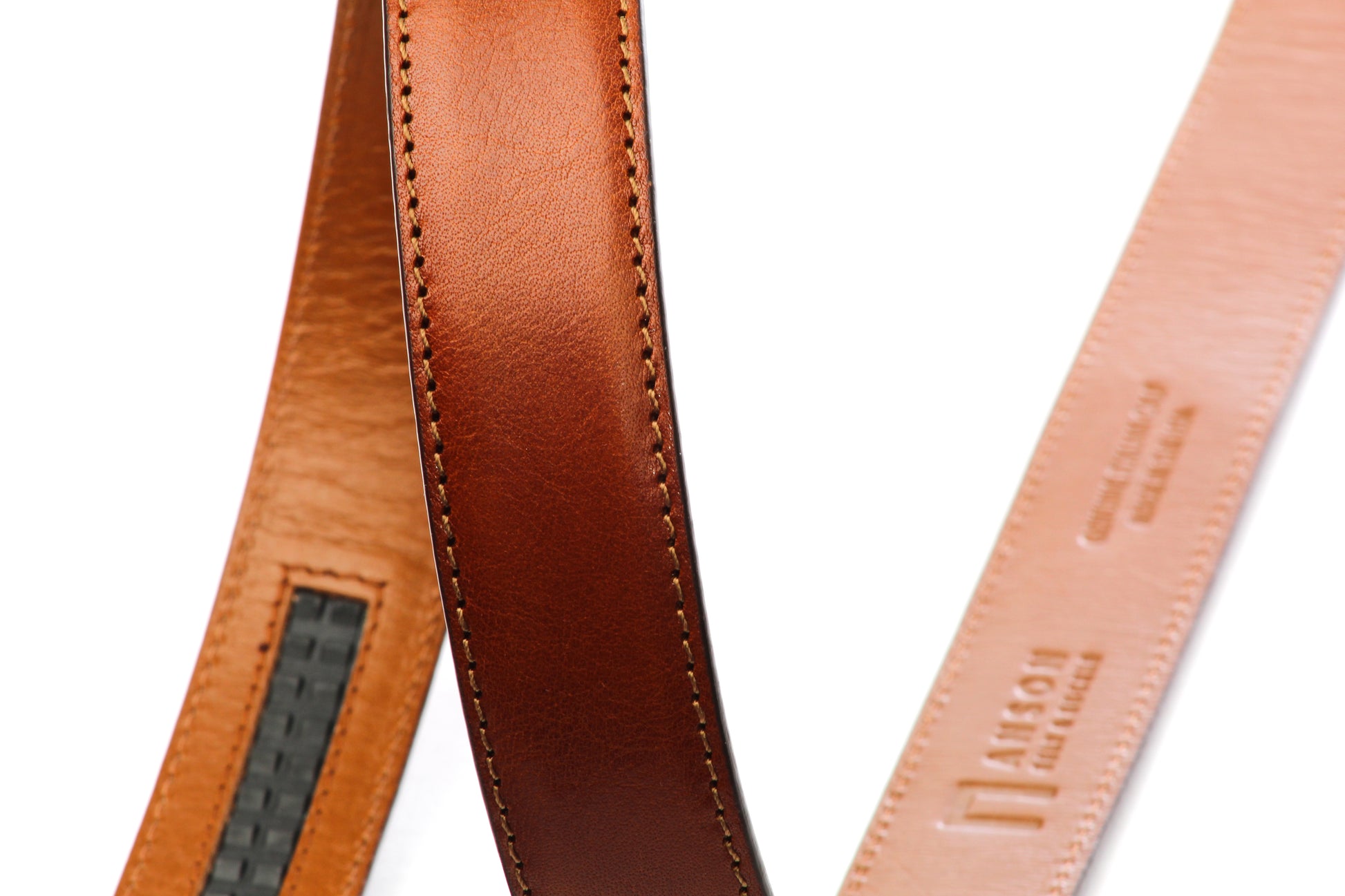 Men's Italian calfskin belt strap in cognac with a 1.25-inch width, formal look, stitching close up