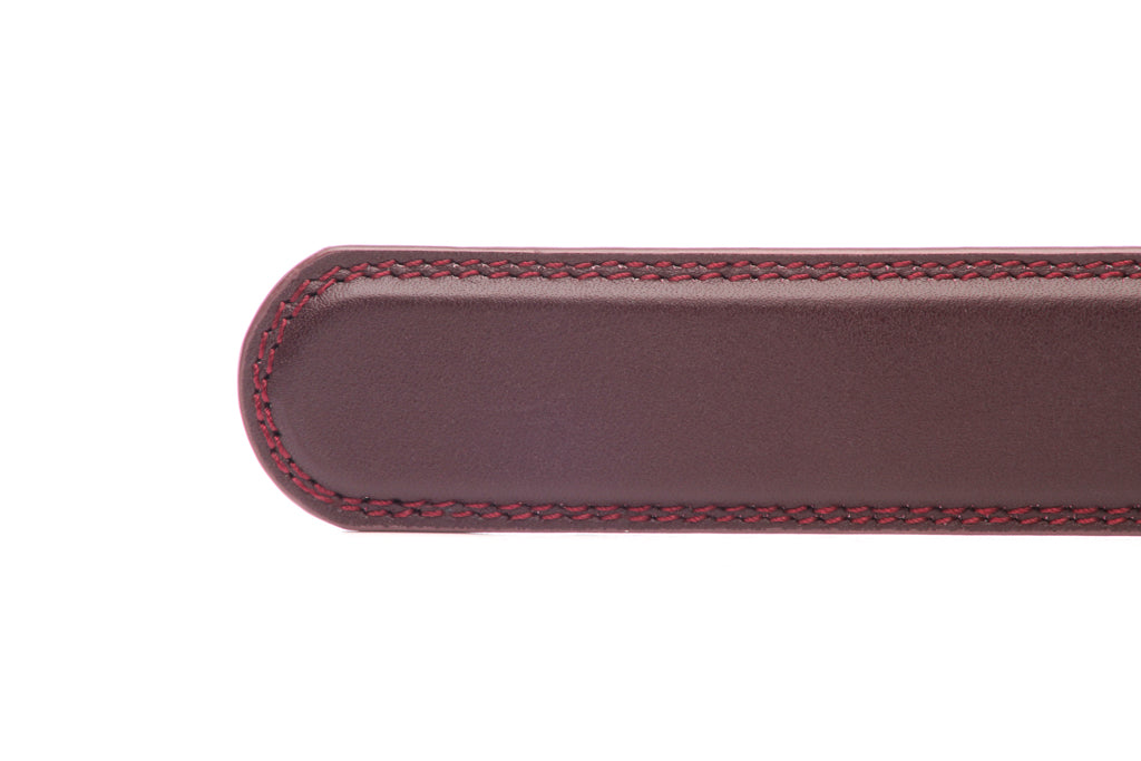 Men's leather belt strap in oxblood with a 1.25-inch width, formal look, tip of the strap