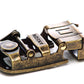 Men's traditional with a curve ratchet belt buckle in antiqued gold with a 1.25-inch width, mechanism view.