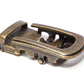 Men's traditional with a curve ratchet belt buckle in antiqued gold with a width of 1.5 inches, right side view.