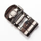 Men's traditional with a curve ratchet belt buckle in formal gunmetal with a width of 1.5 inches, mechanism view.