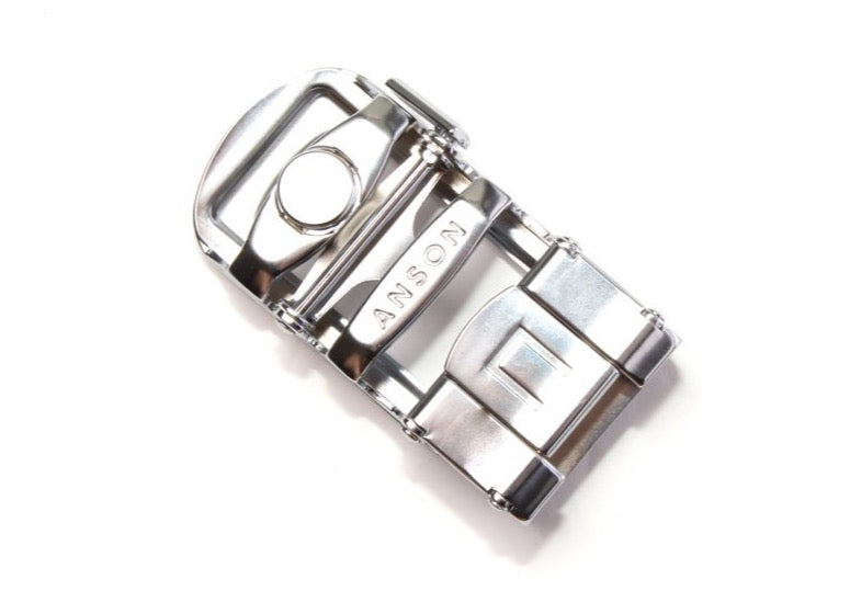 Men's traditional with a curve nickel free ratchet belt buckle with a width of 1.5 inches, mechanism view.