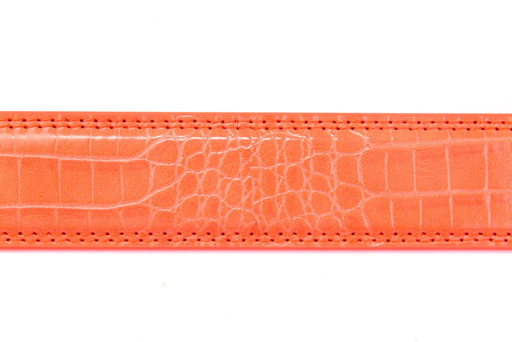 Women's faux gator belt strap in coral, 1.25 inches wide, formal look, stitching close up