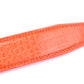Alt tag 4: Women's faux gator belt strap in coral, 1.25 inches wide, formal look, tip of the strap