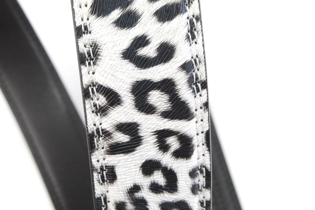 Women's vegan leather belt strap in snow leopard print, 1.25 inches wide, casual look, curled up