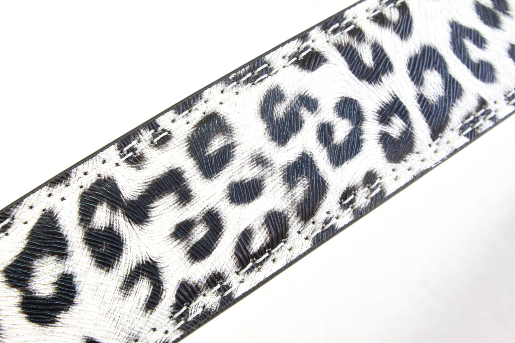 Women's vegan leather belt strap in snow leopard print, 1.25 inches wide, casual look, stitching close up