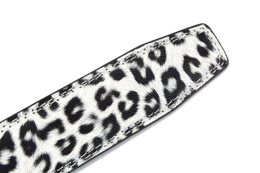 Women's vegan leather belt strap in snow leopard print, 1.25 inches wide, casual look, tip of the strap